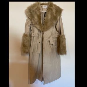 Faux leather coat with fur. Brand new never worn with tags attached